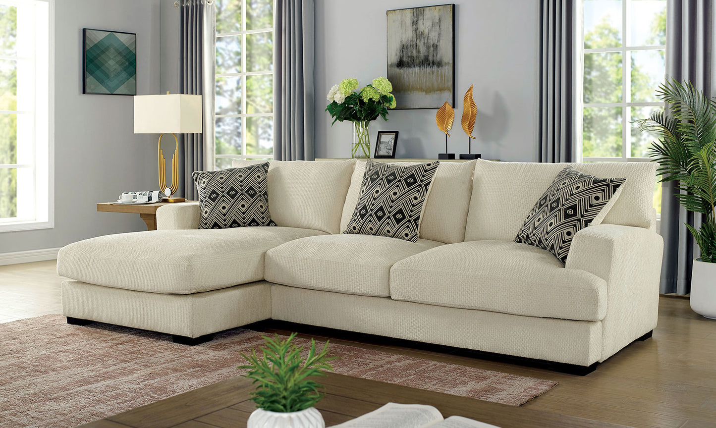 Cream textured sectional sofa with geometric throw pillows for living room comfort