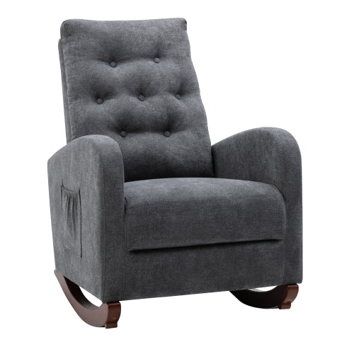 Comfortable dark grey fabric upholstered rocking chair with tufted back and armrest pocket