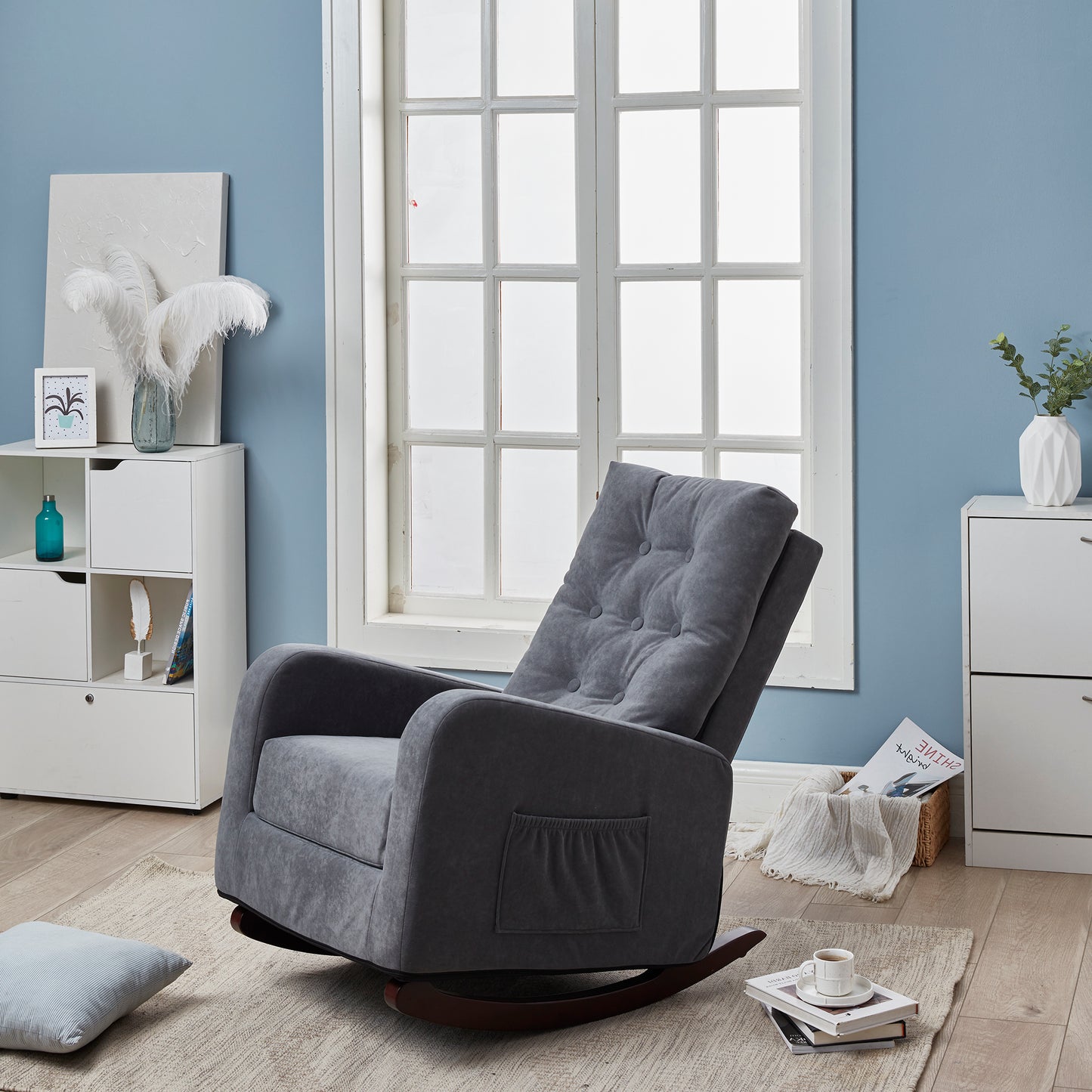 Tufted upholstered grey fabric rocking chair with side pocket perfect for living rooms