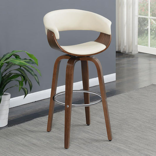 Cream upholstered midcentury modern bar stool with a walnut wood frame and silver footrest