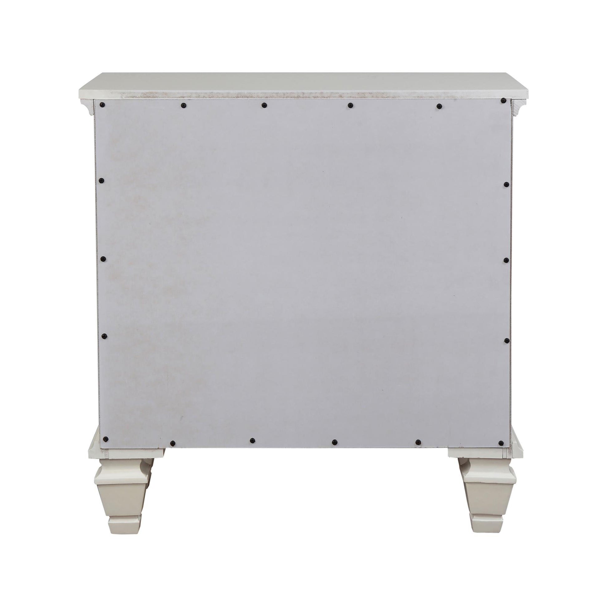 Back view of antique white nightstand with carved wooden legs