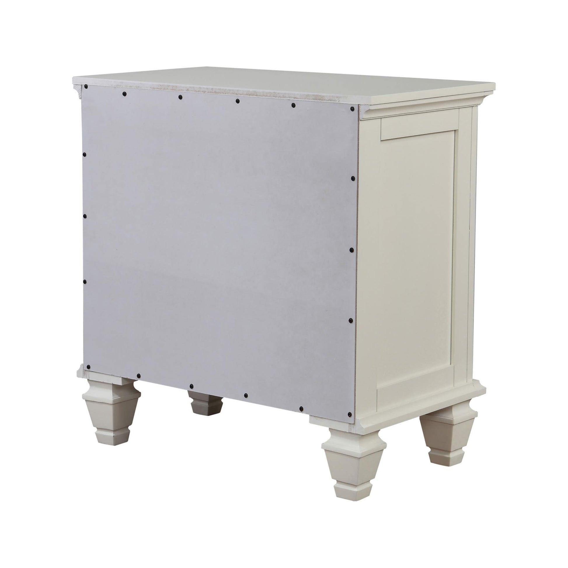 Cream bedside table with decorative legs and inset panel detail