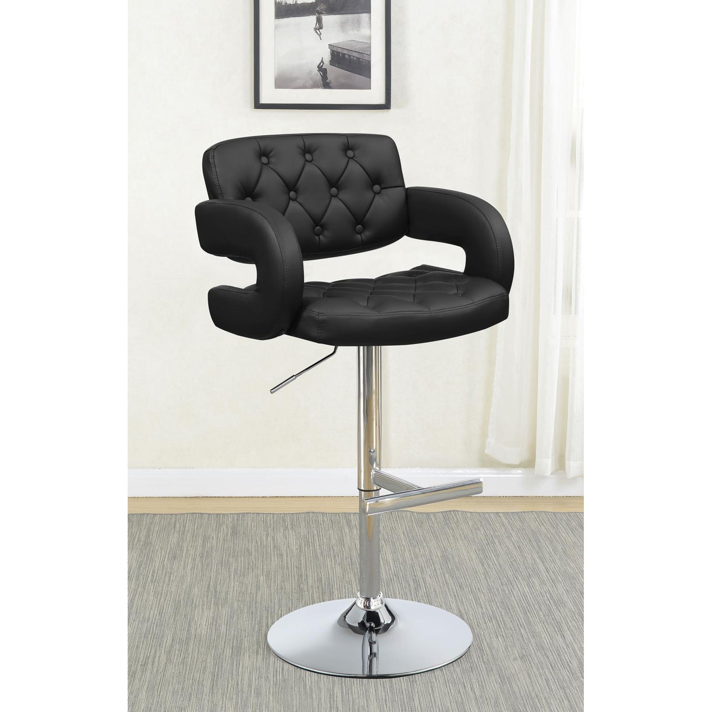 Tufted black leather bar stool with chrome base and adjustable height