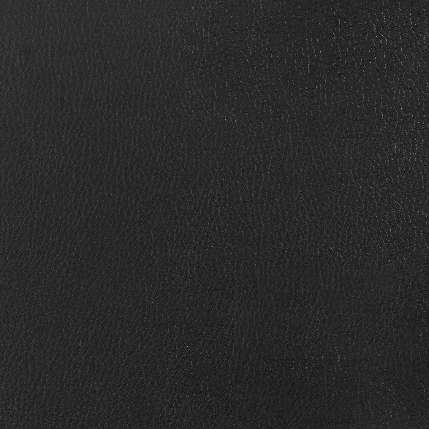 Closeup of textured black vegan leather fabric ideal for upholstery and accessories