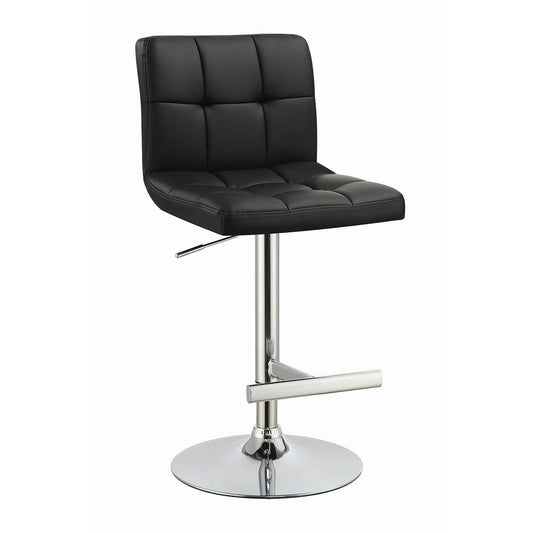 Black tufted faux leather bar stool with chrome base and footrest