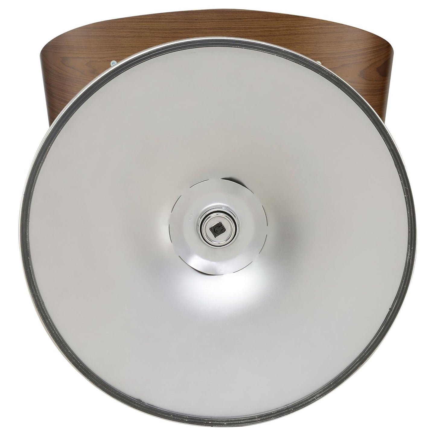 Closeup of a modern swivel stool base with polished chrome and wood grain detail