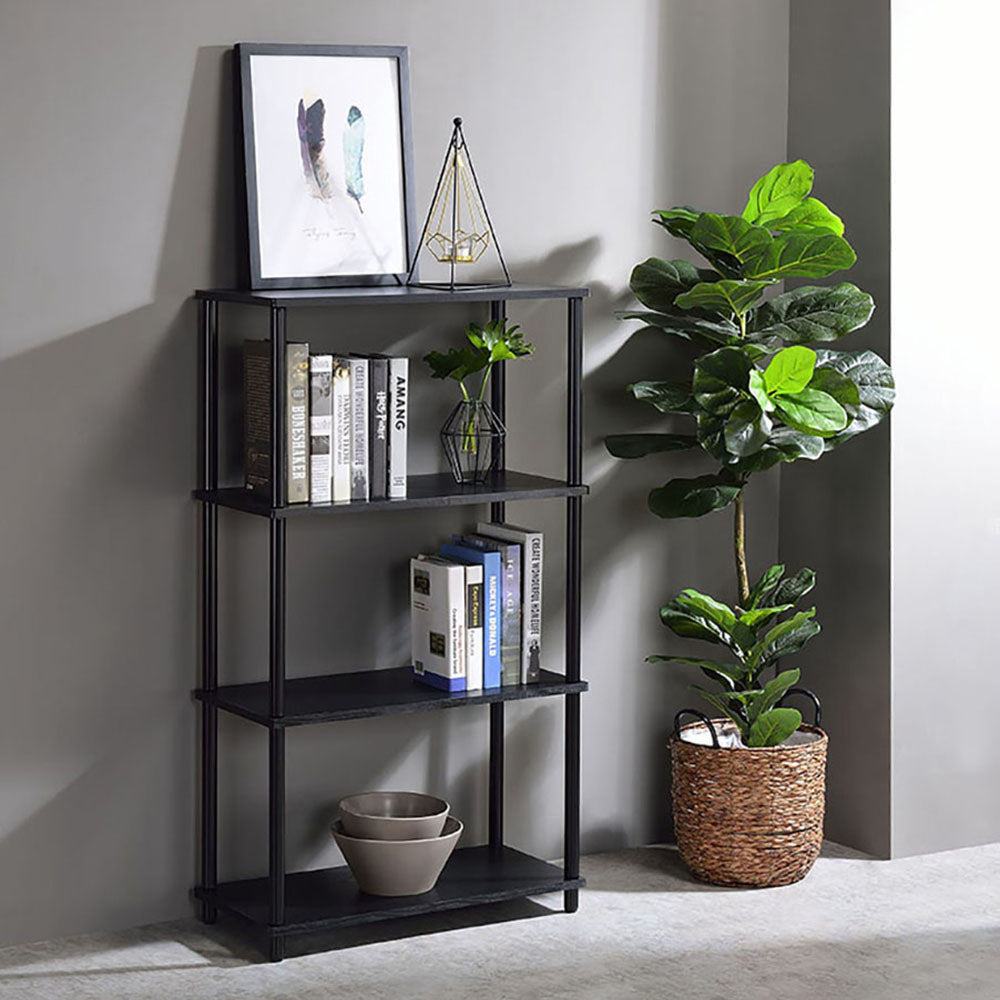 Black metal bookshelf with four shelves holding books and decor