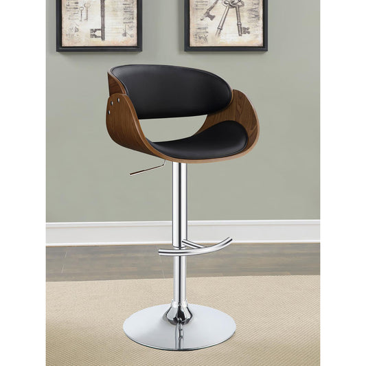 Adjustable black leather bar stool with curved walnut wood shell and chrome base