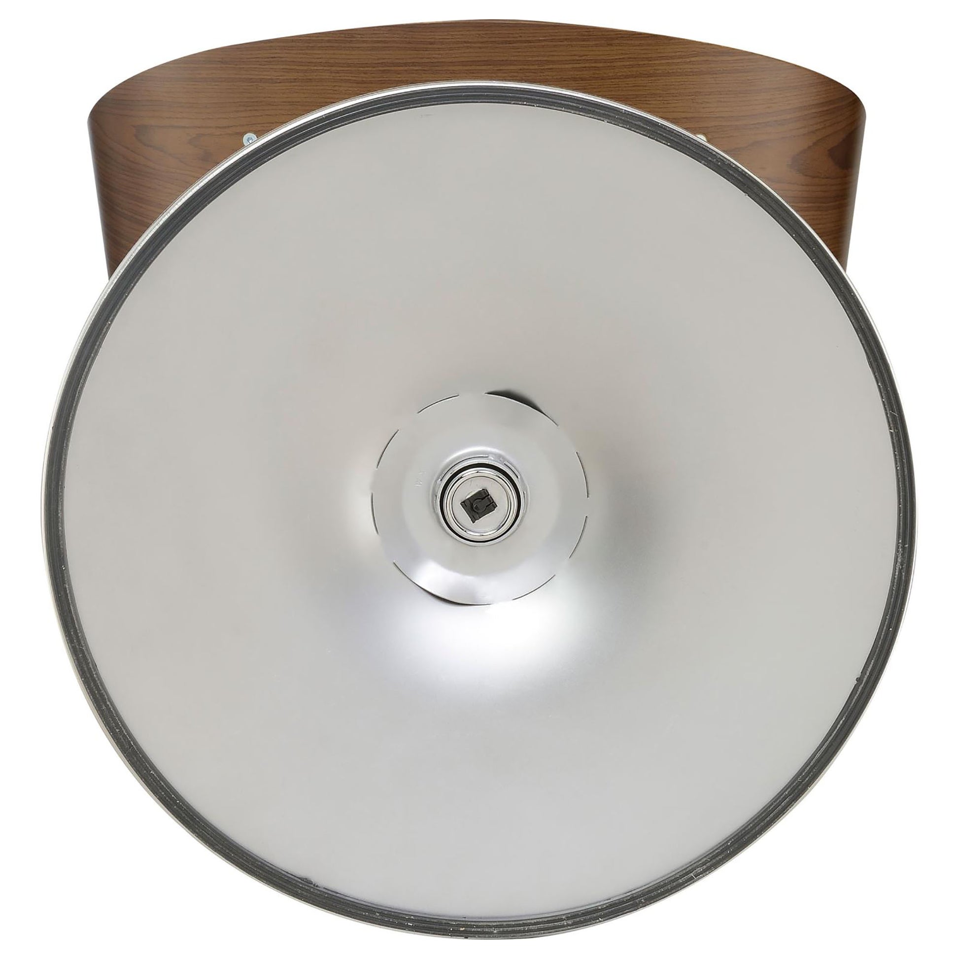 Closeup of the polished metal base and curved wood seat of a modern stool