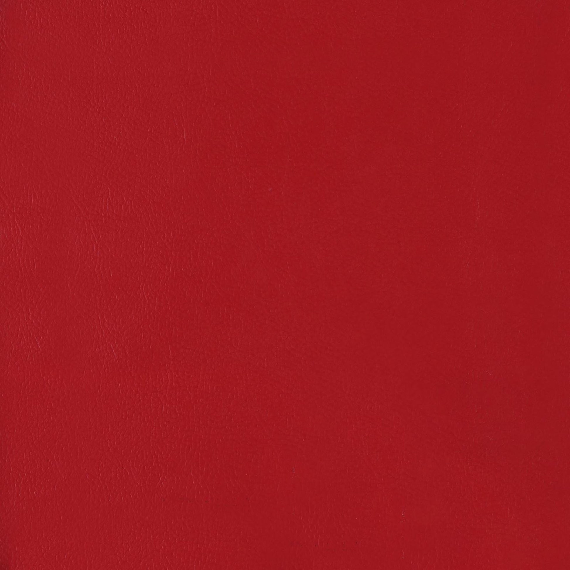 Textured red faux leather upholstery fabric sample