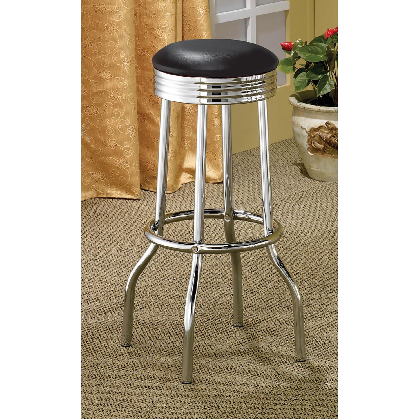 Black vinyl retro diner stool with chrome accents and circular footrest