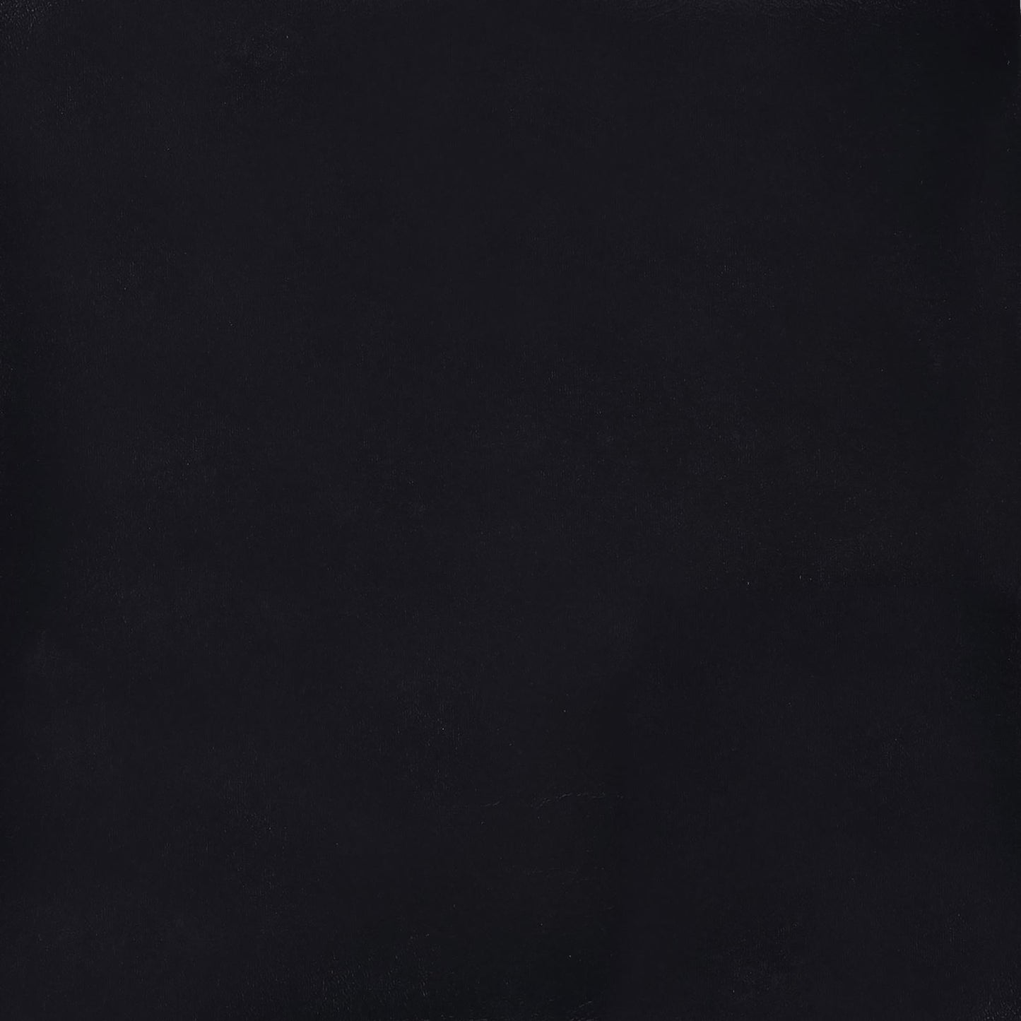 Solid black textured fabric swatch with subtle sheen