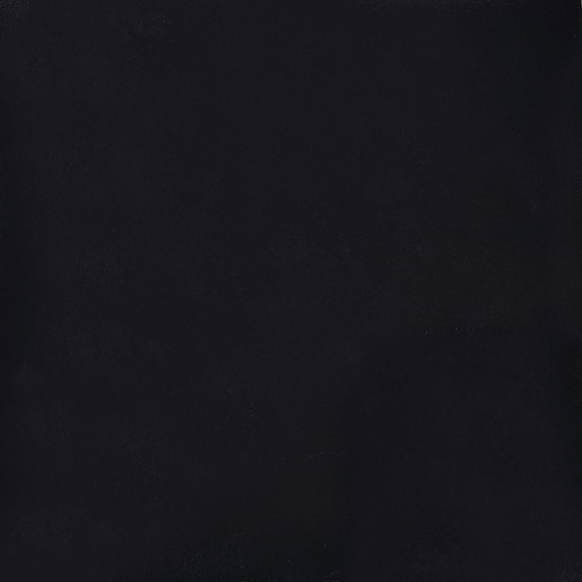 Solid black textured fabric swatch with subtle sheen