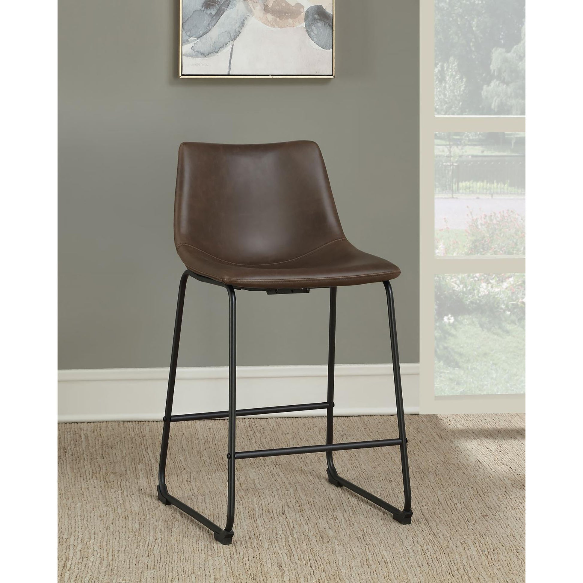 Brown faux leather counter stool with black metal legs and minimalist design