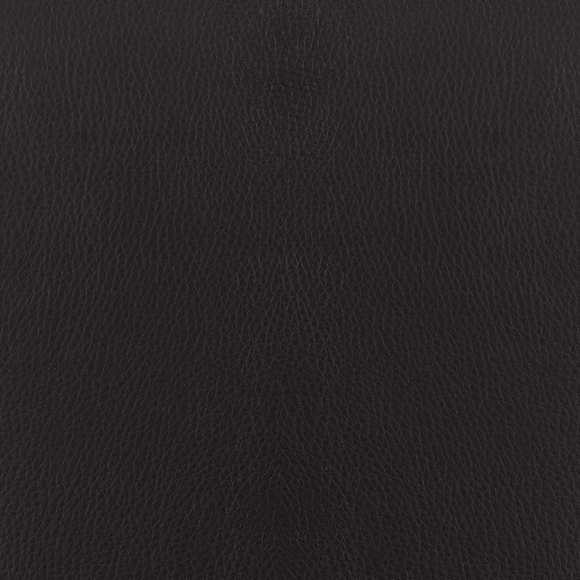 Closeup texture of black pebble grain leather for upholstery