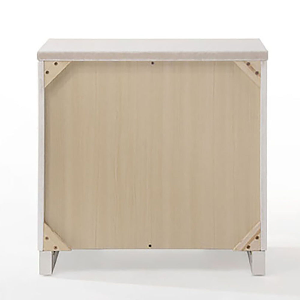 Back view of a white wood filing cabinet with light wood drawer panel