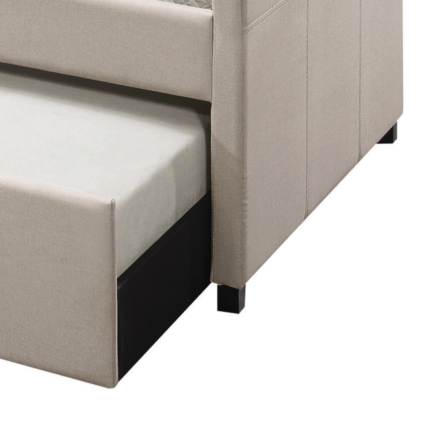 Beige upholstered sofa with a pullout trundle bed showcasing a modern design