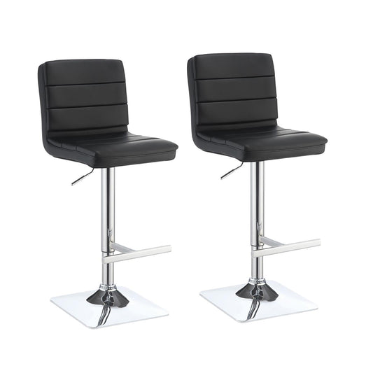 Two black leatherette adjustable height bar stools with chrome bases and footrests