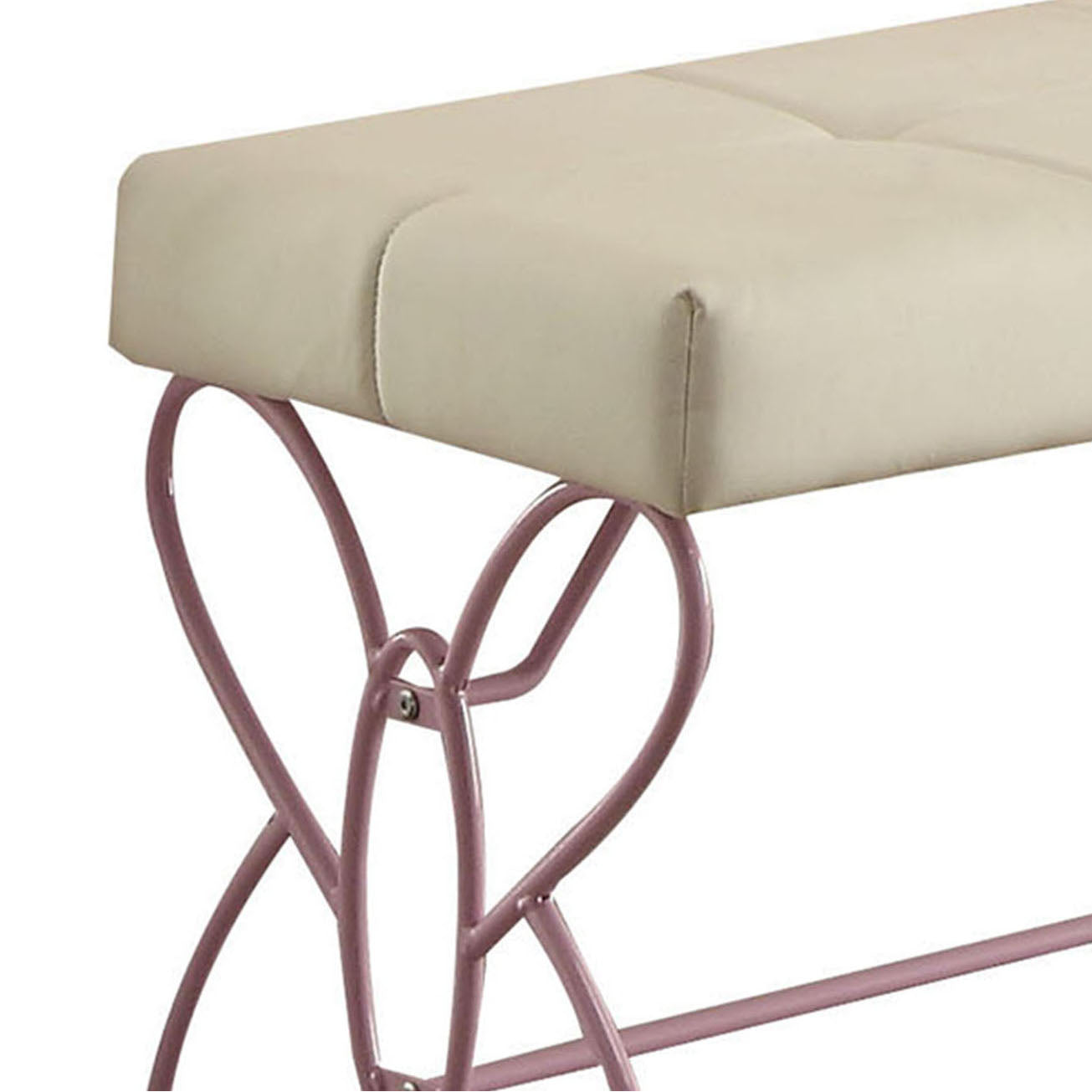 Cream tufted bench with decorative pink heartshaped metal legs ideal for vanity use