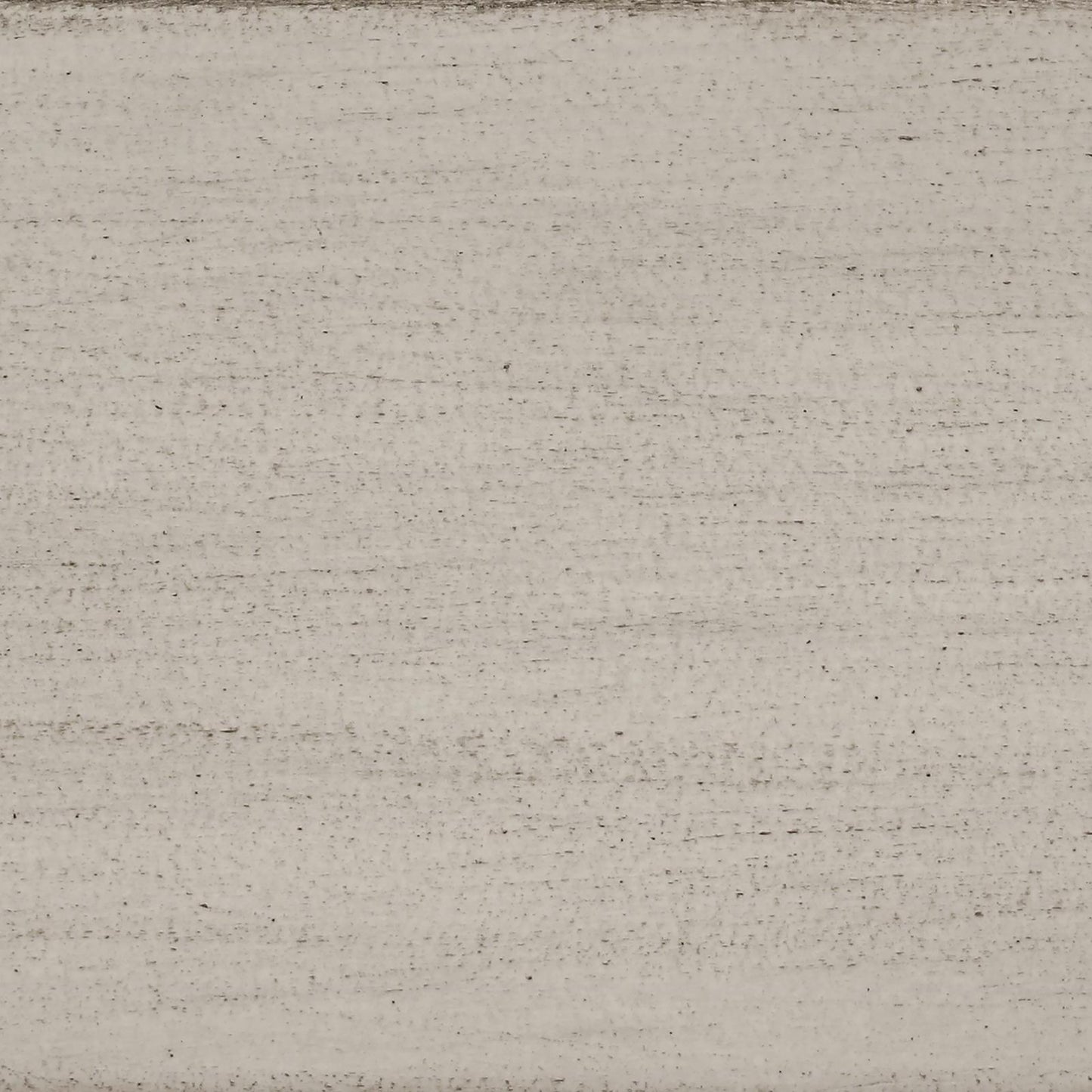 Closeup of distressed wood texture in antique white for furniture finishes