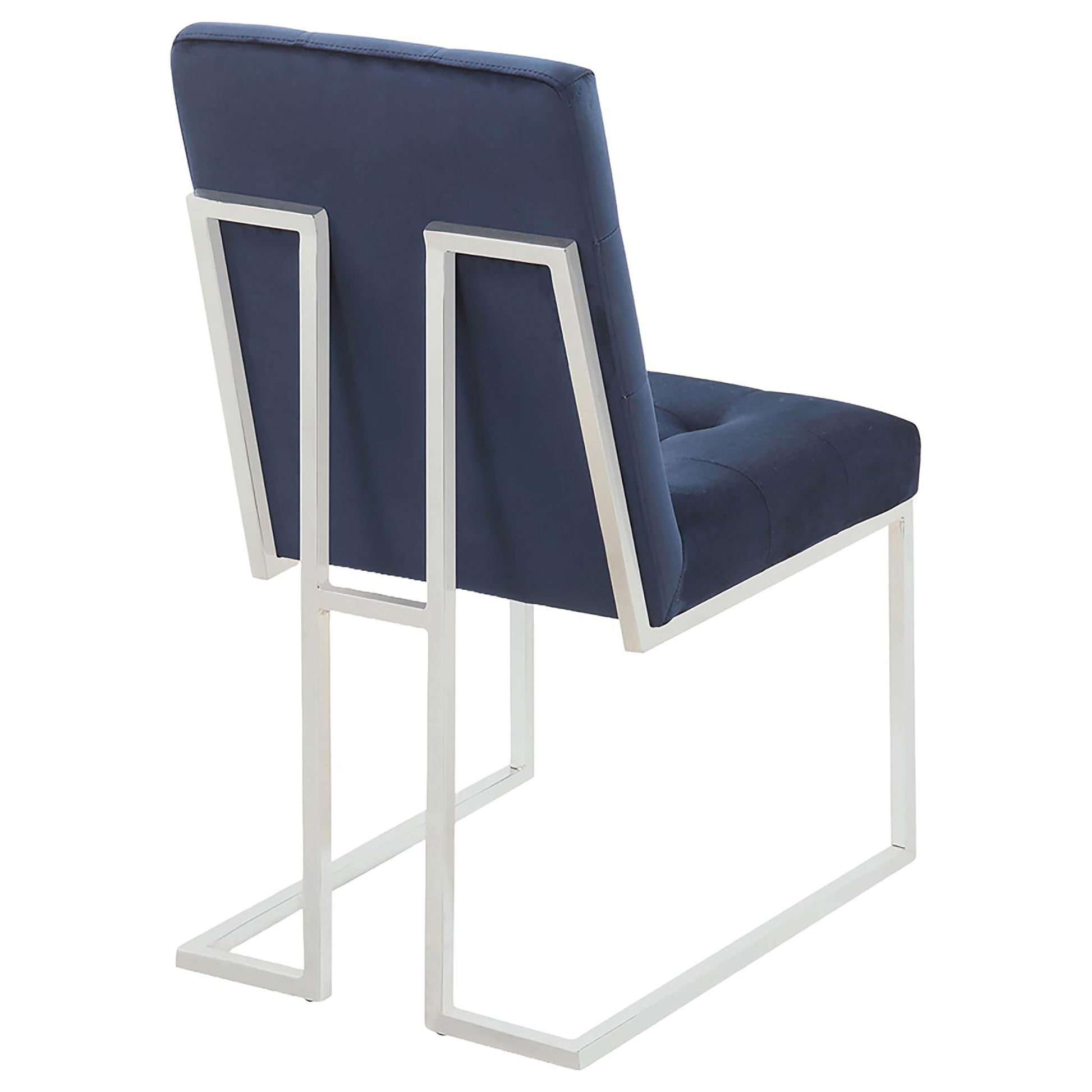 Tufted navy velvet dining chair with sleek chrome sled base
