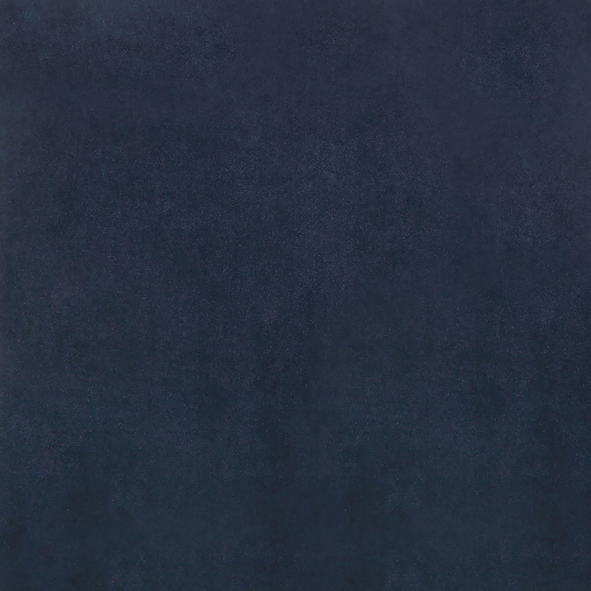 Deep navy blue velvet upholstery fabric ideal for furniture accents