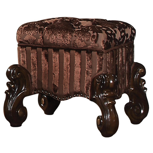 Ornate dark brown velvet ottoman with tufted top and carved wooden legs