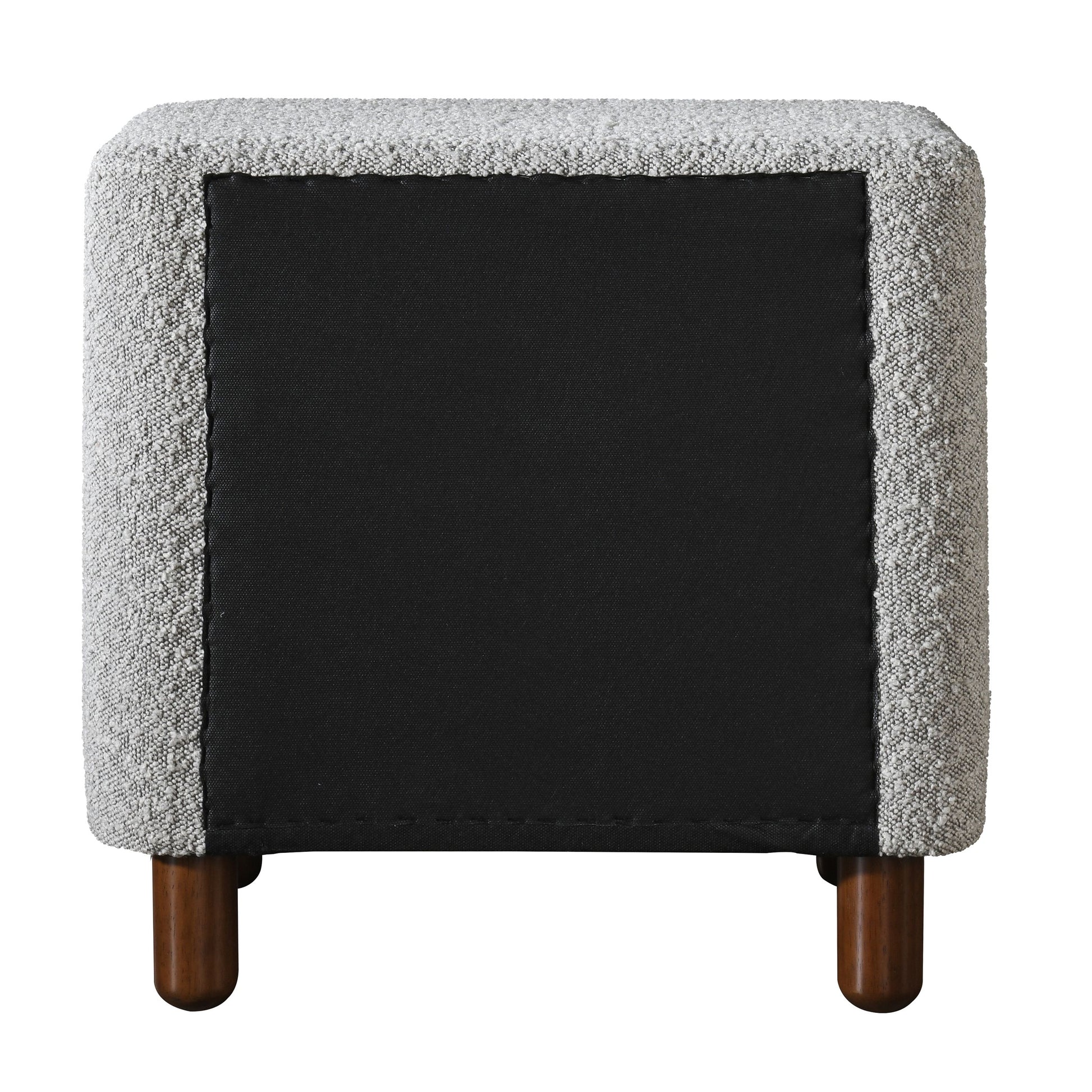 Textured gray upholstered ottoman with dark wood legs