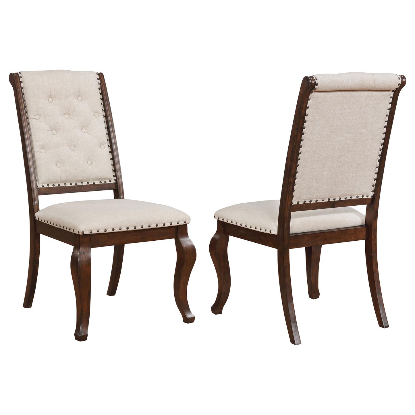 Tufted beige fabric dining chair with dark wood frame and nailhead trim