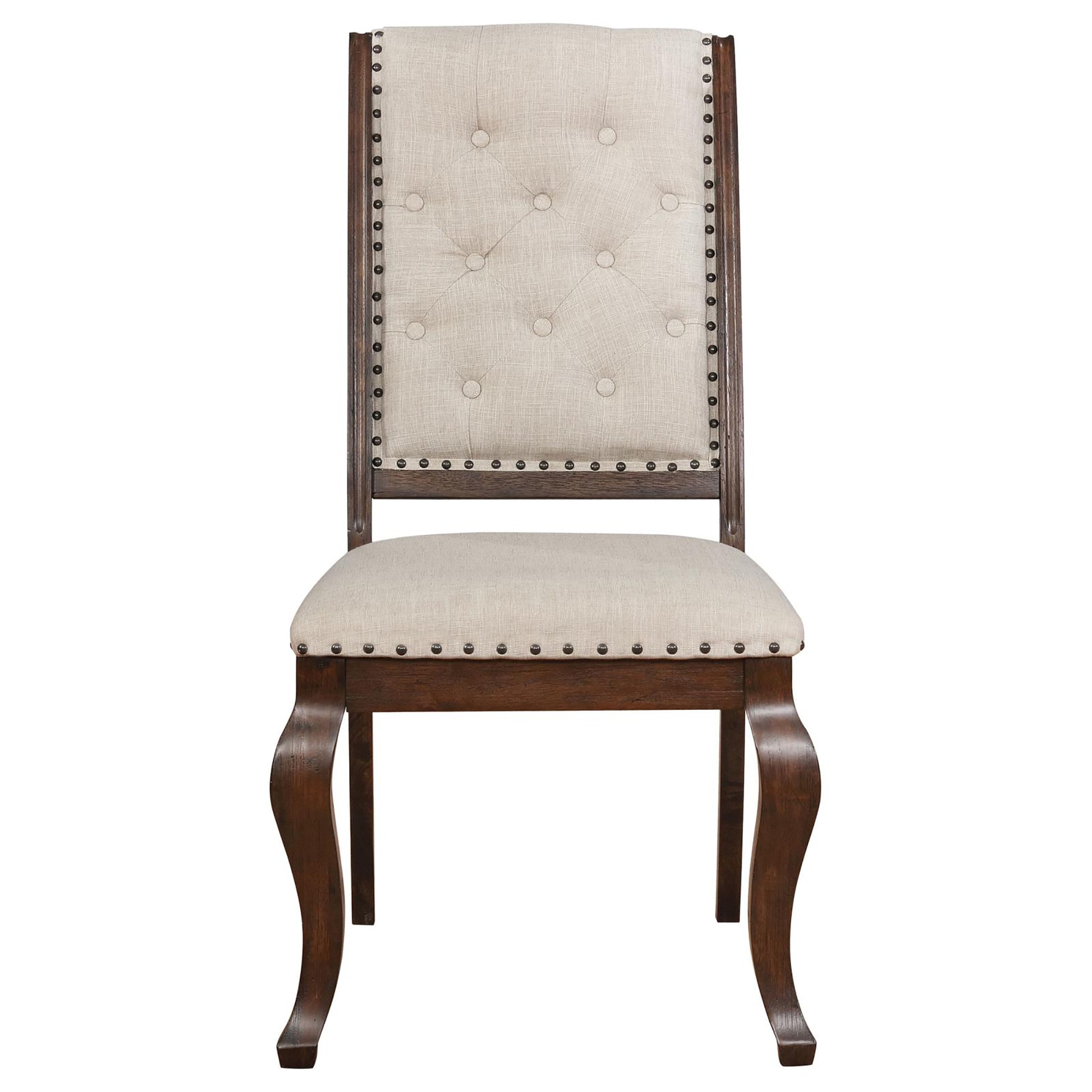 Tufted linen dining chair with nailhead trim and dark wood legs elegant design