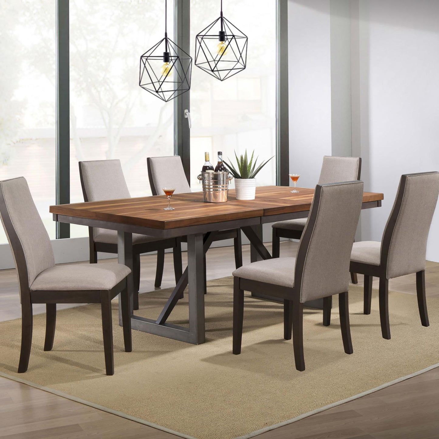 Modern walnut dining table with grey upholstered chairs set for a meal