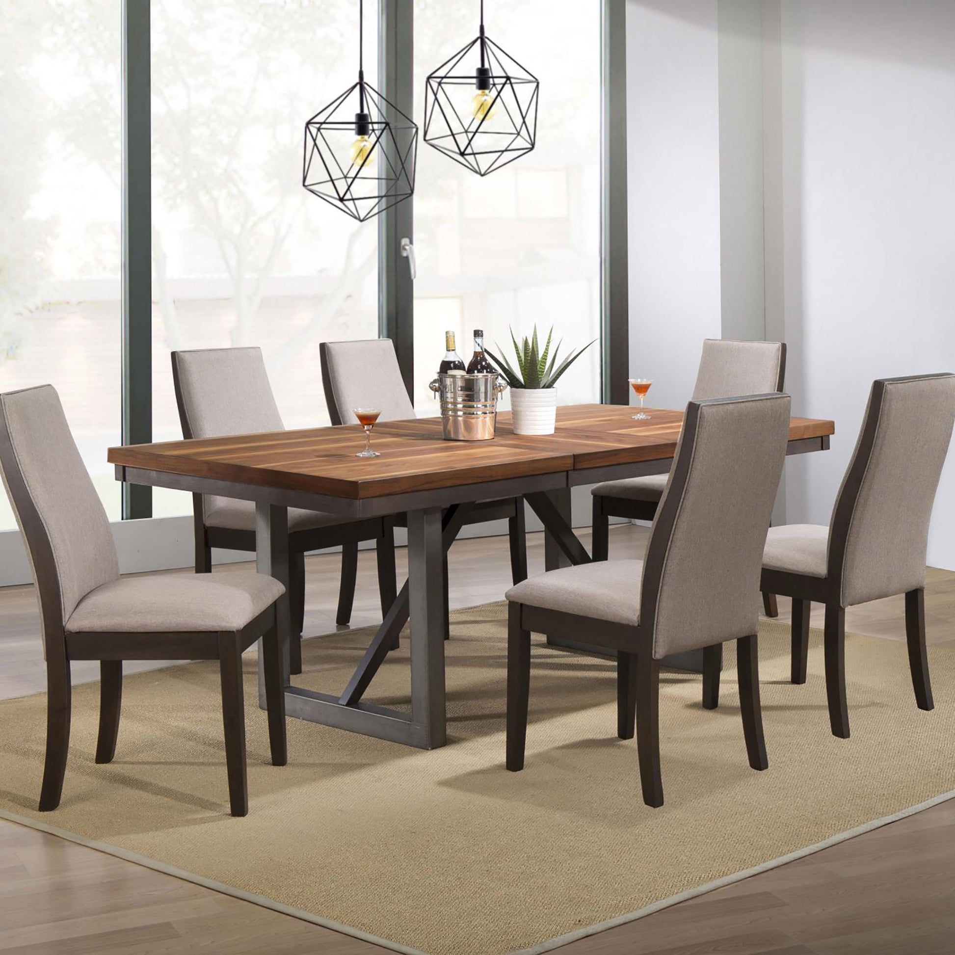 Modern walnut dining table with grey upholstered chairs set for a meal