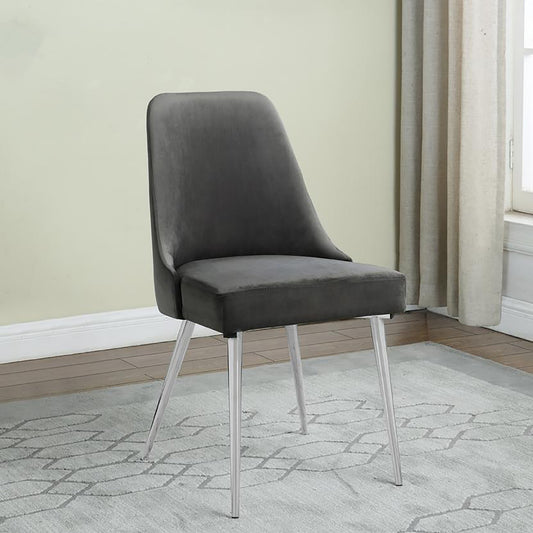 Dark gray velvet dining chair with sleek chrome legs