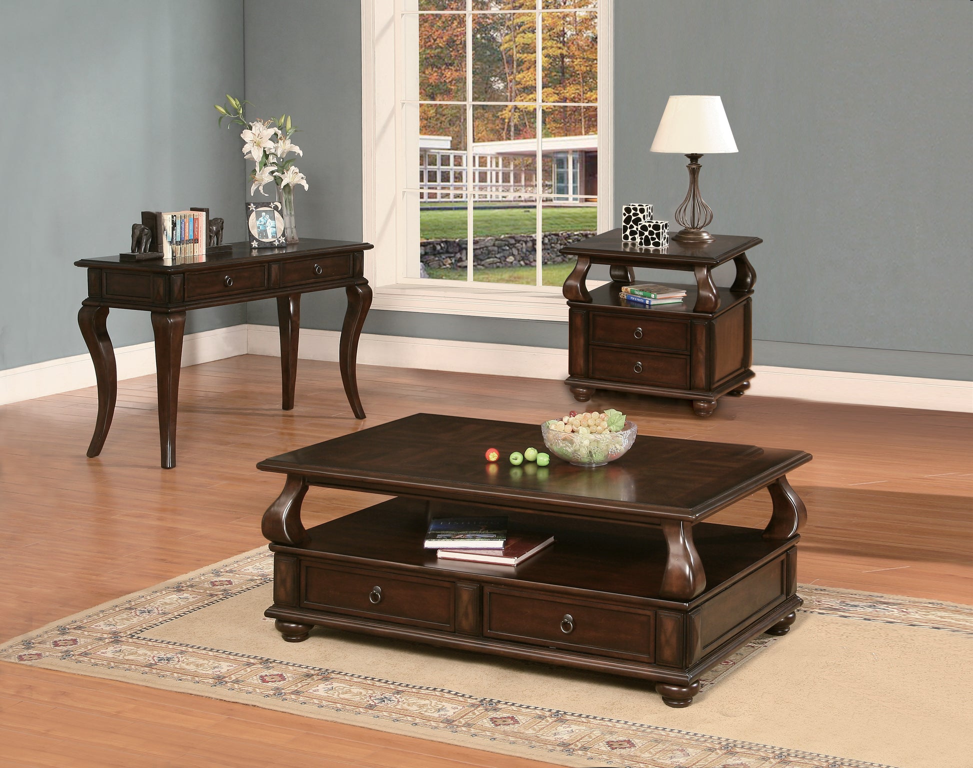 Dark wood coffee table with ornate legs and two drawers perfect for living rooms