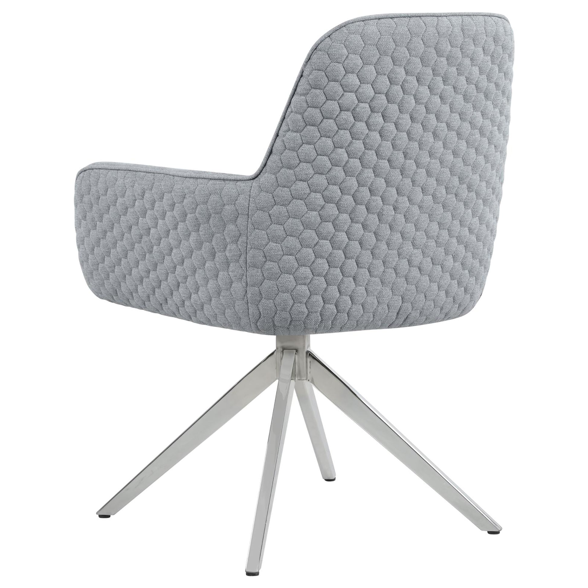 Grey upholstered accent chair with hexagonal pattern and chrome star base