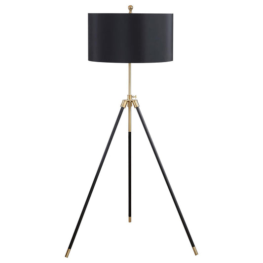 Modern tripod floor lamp with black shade and gold accents