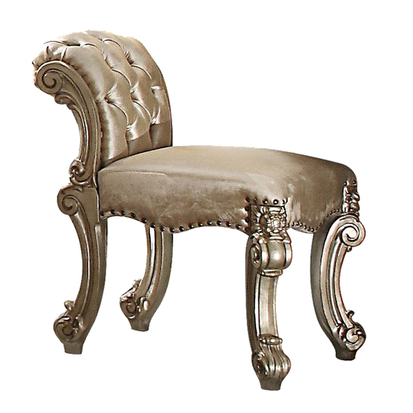 Elegant antique vanity stool with tufted champagne upholstery and ornate silver legs
