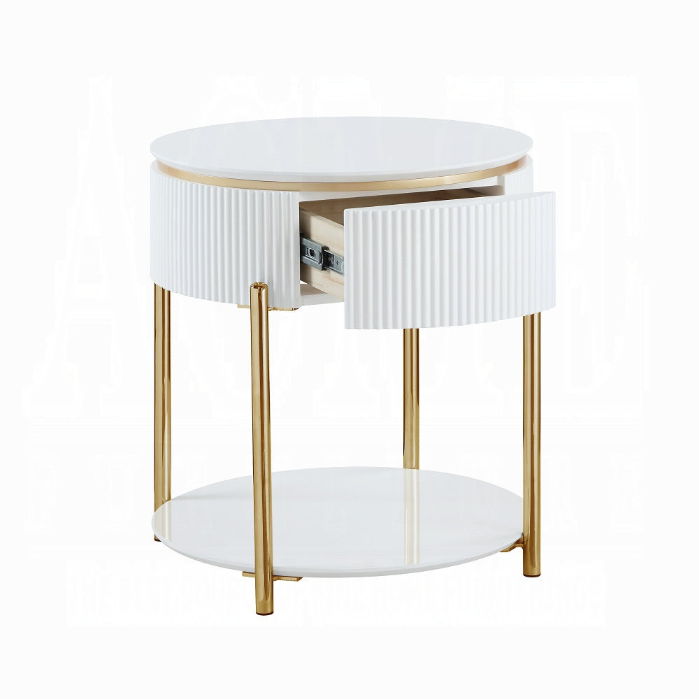 White round end table with fluted drawer and gold legs