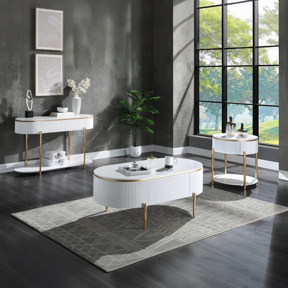 Oval white fluted coffee table with gold legs