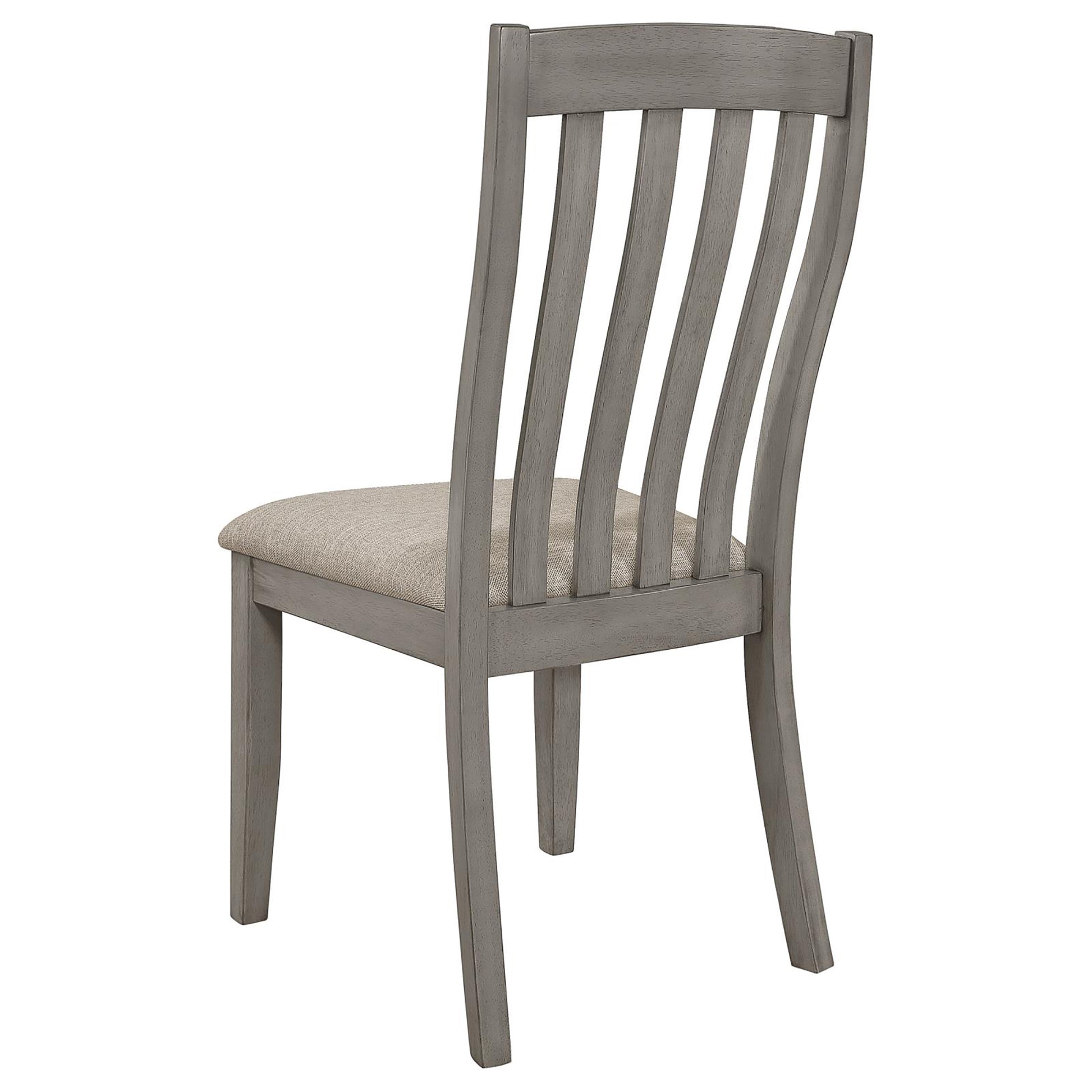 Gray wooden dining chair with curved slatted back and upholstered seat