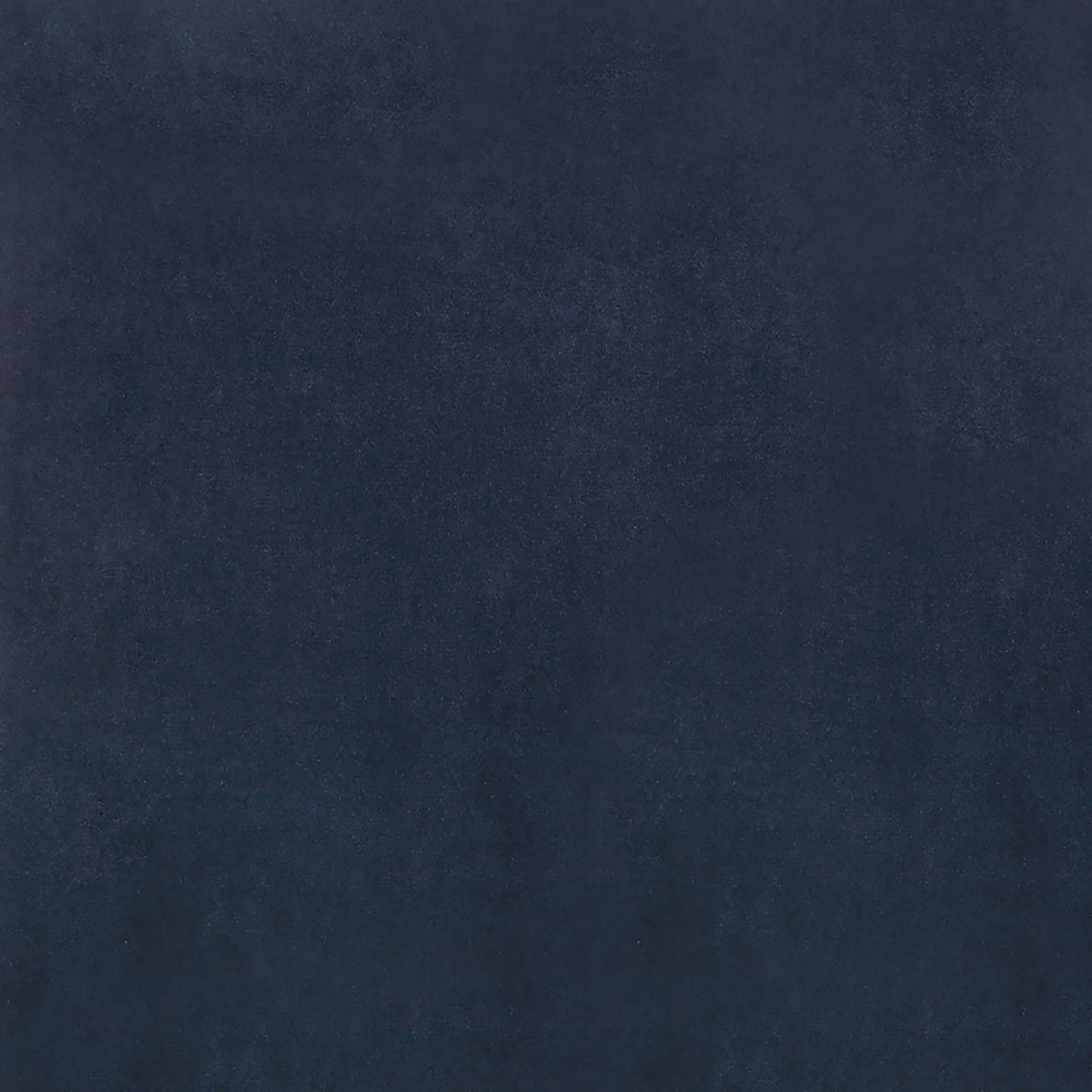 Navy blue velvet fabric with a soft plush texture for upholstery projects