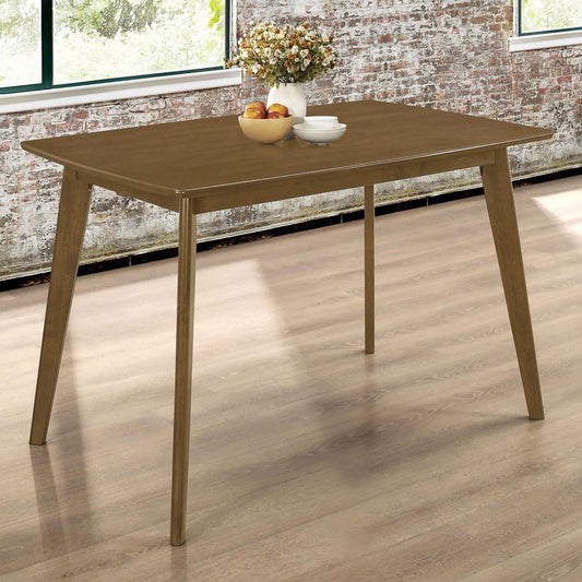 Rectangular wooden dining table with tapered legs perfect for a midcentury modern kitchen