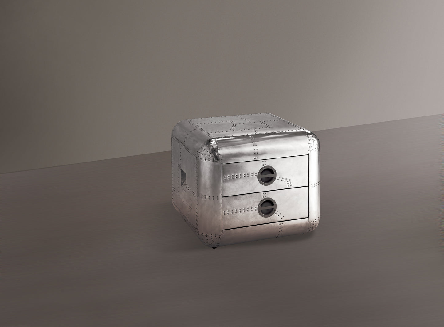 Riveted silver aviator style nightstand with two drawers and circular handles