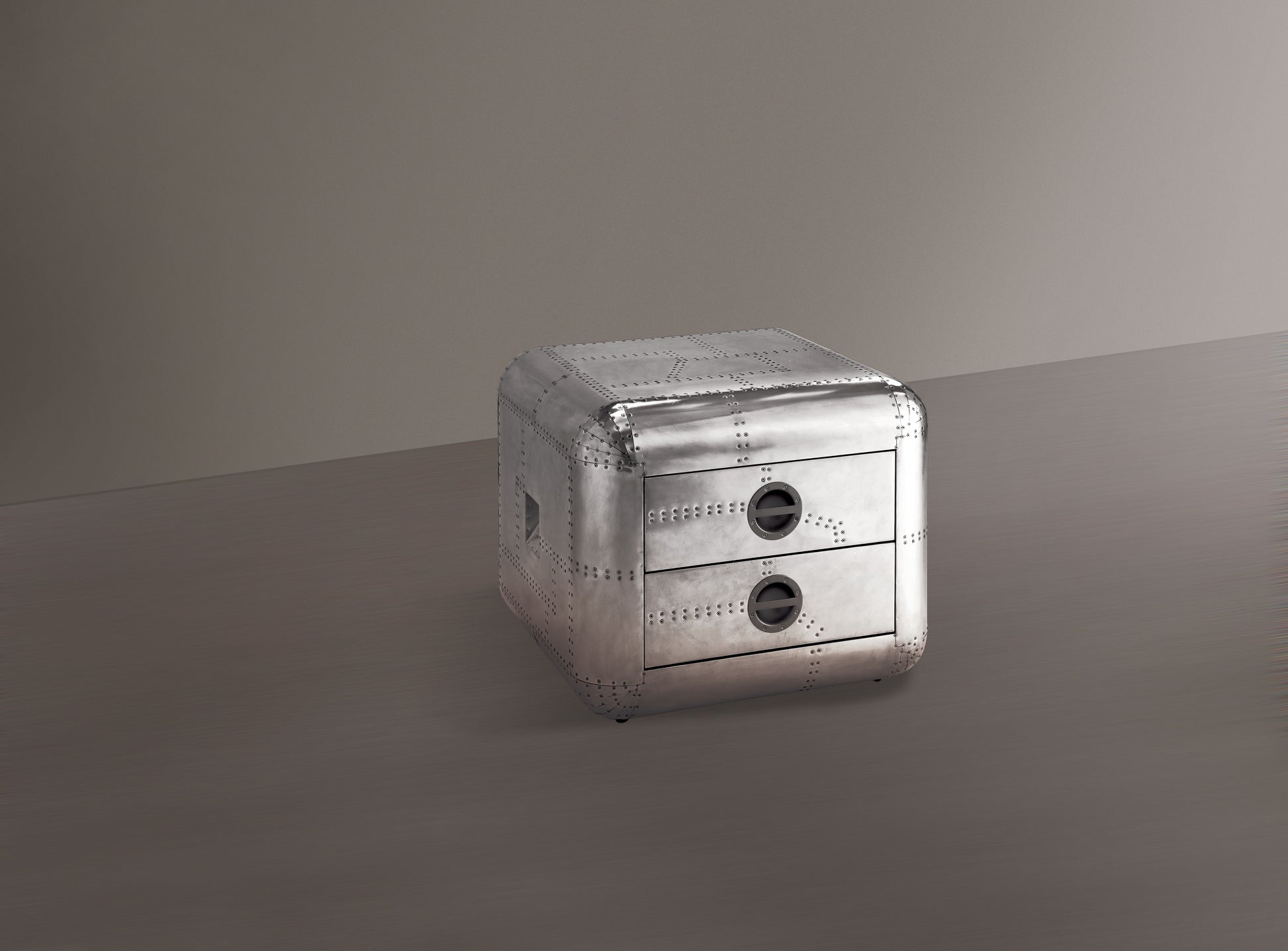 Riveted silver aviator style nightstand with two drawers and circular handles