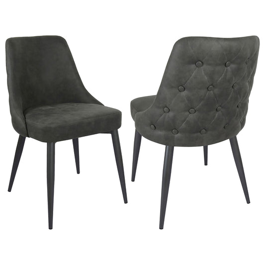 Dark grey tufted accent chair with black tapered legs ideal for dining rooms