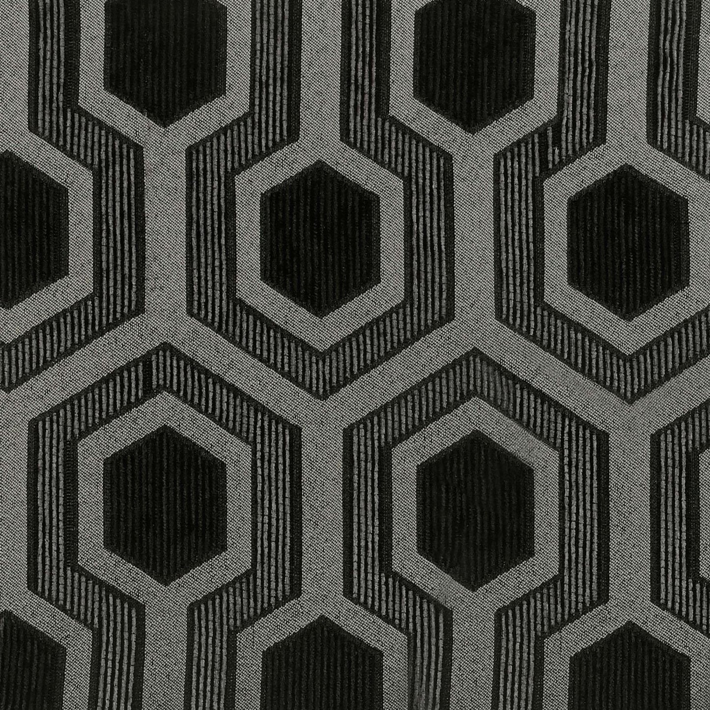 Black and grey geometric hexagonal pattern fabric with textured detail