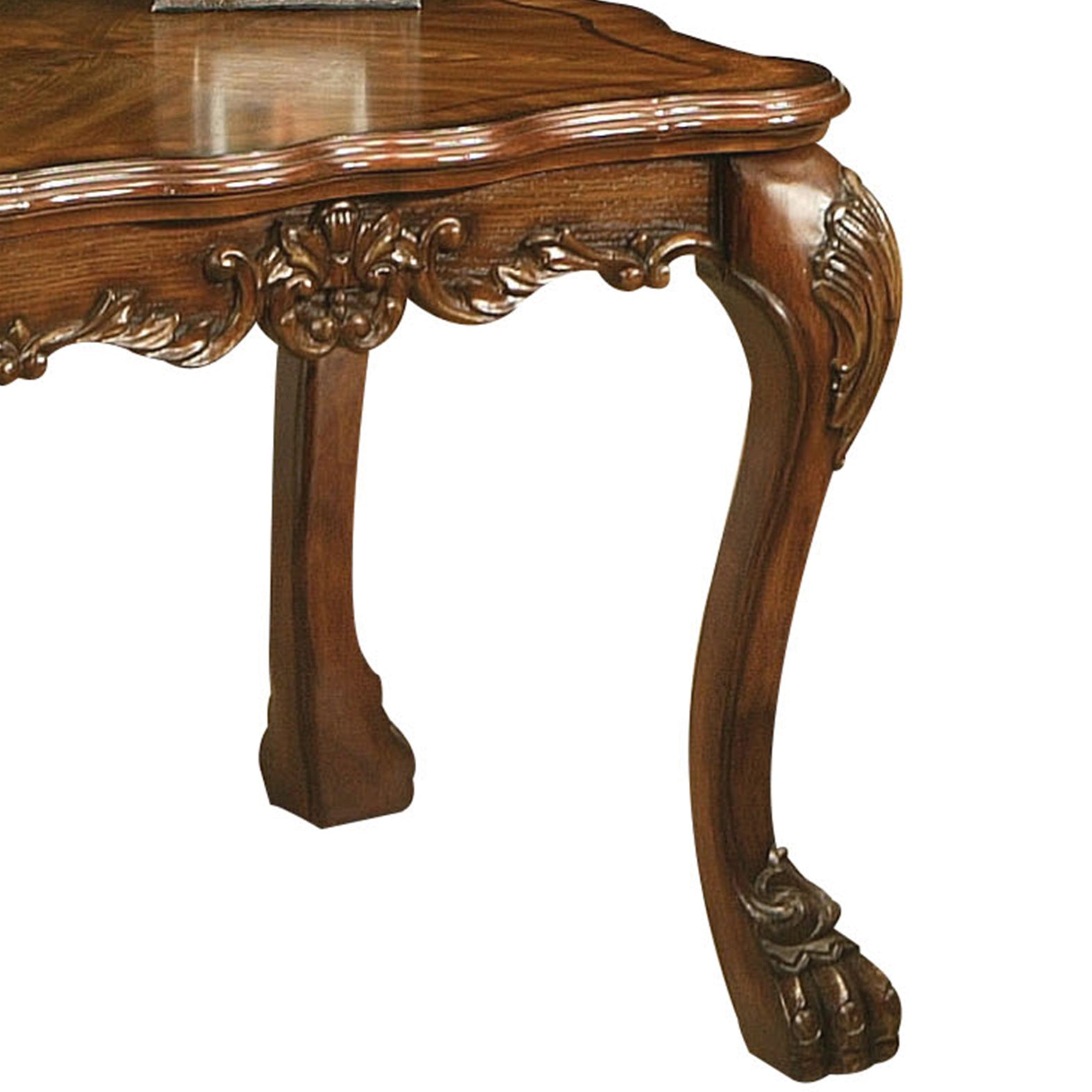 Antique wood side table with carved details and ornate claw foot perfect for elegant living rooms