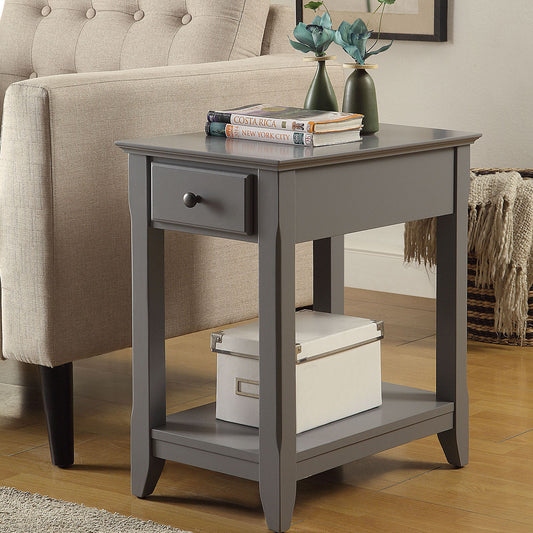 Gray end table with drawer and open shelf next to sofa