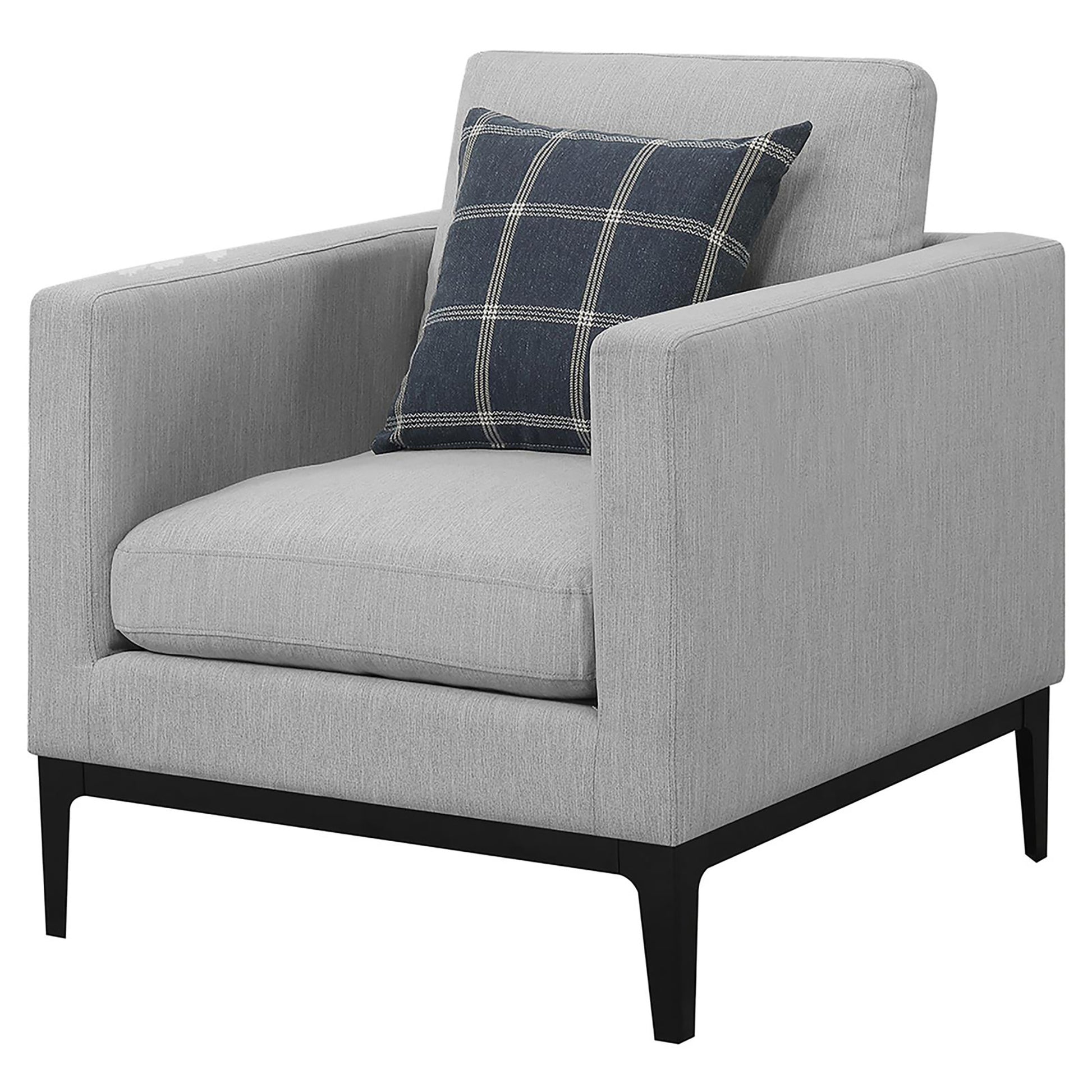 Grey fabric armchair with dark modern legs and a plaid accent pillow