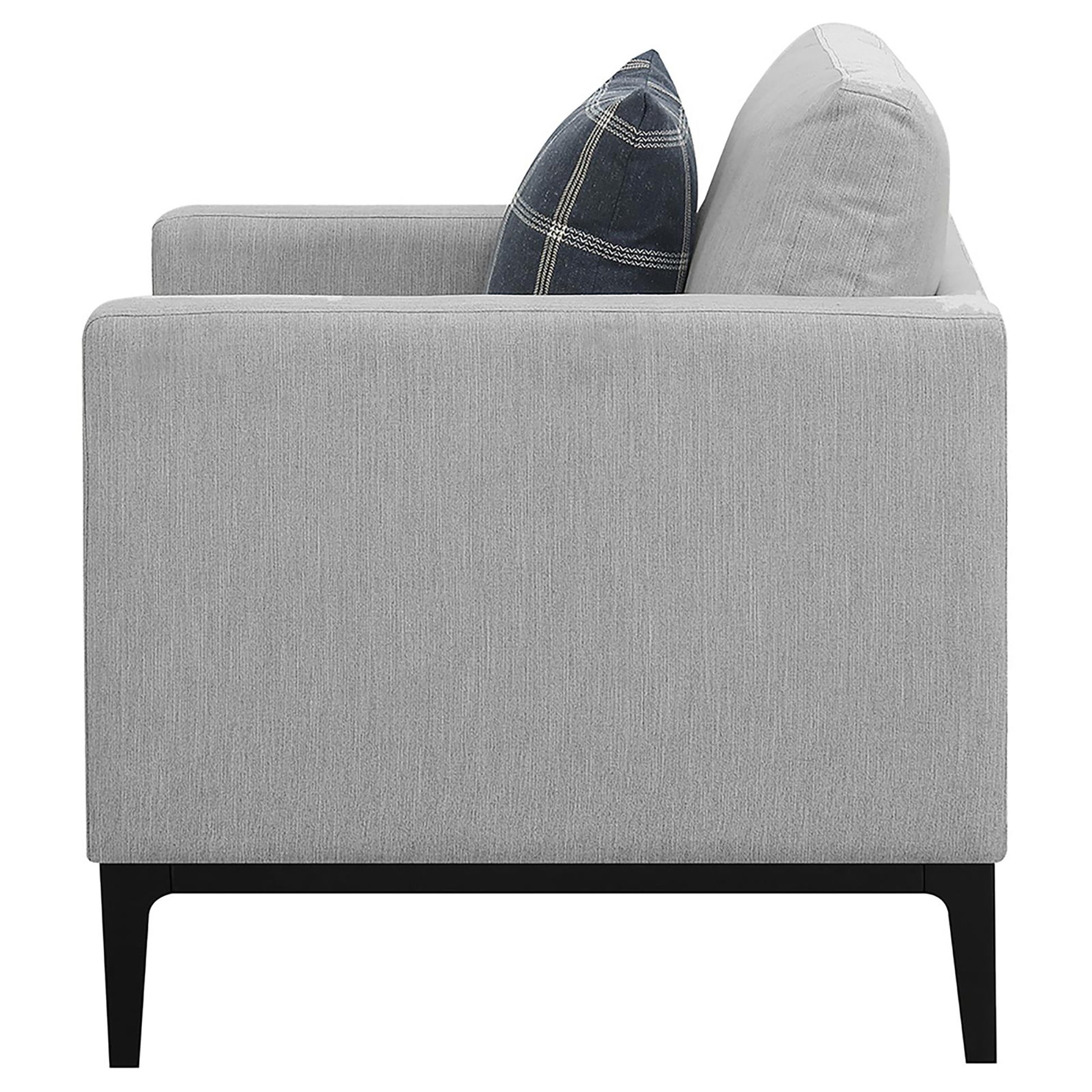 Light gray upholstered armchair with subtle textured fabric and black legs